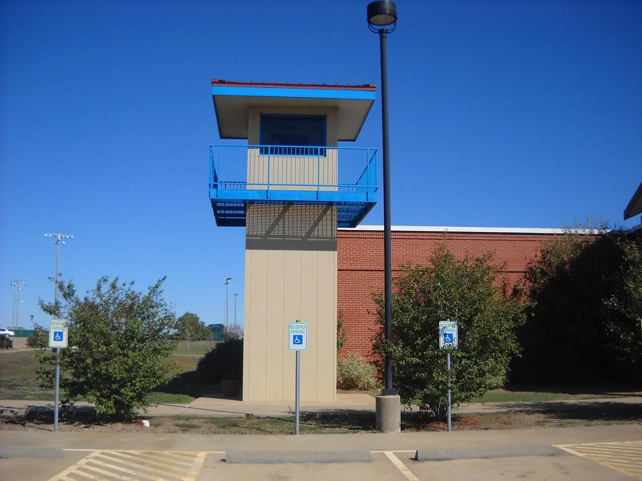 prison, jail, tower, lookout, correctional, protection, lockup, security, blue security, blue prison. ADA self-storage compliance: who is covered and what to fix