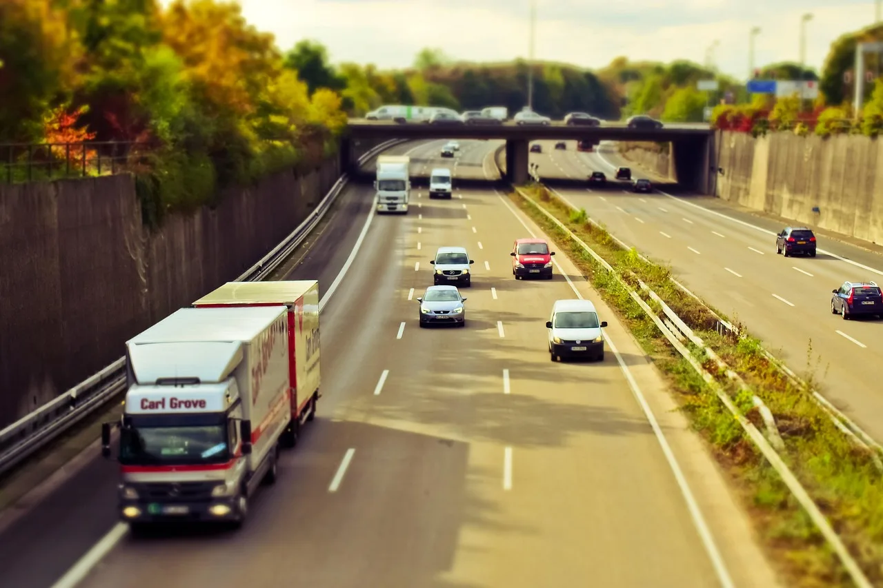 highway, automobile, traffic, road, ride, vehicles, speed, driving a car, move, lane, road system, car, transport, asphalt, road markings, mobility, road transport, quickly, expressway, to travel, eve, evening atmosphere, mood, evening sky, green reserve, guard rail, bridge, highway bridge, concrete, car wallpapers, roadway, concrete wall, distance, limitation, delimitation, driveway, tilt shift, miniature effect, truck. Atlanta self-storage occupancy and the summer moving season